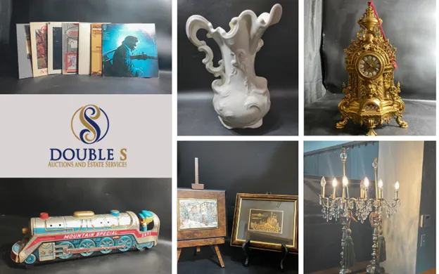 Estate auction table filled with collectibles and household items at Double S Auctions in Amarillo