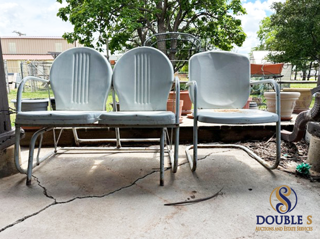 old metal chairs in the auction home backyard
