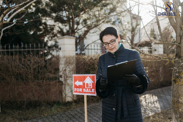 Estate professional reviewing property details for a full estate cleanout process